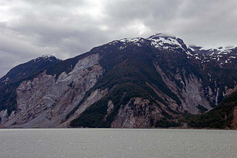 20071218 143717 D2X 4200x2800.jpg - Mountains on northern coast of inlet to Puerto Chacabuco. Note the deforested area which are the result of very recent (mid 2007) earthquake activity in Chile